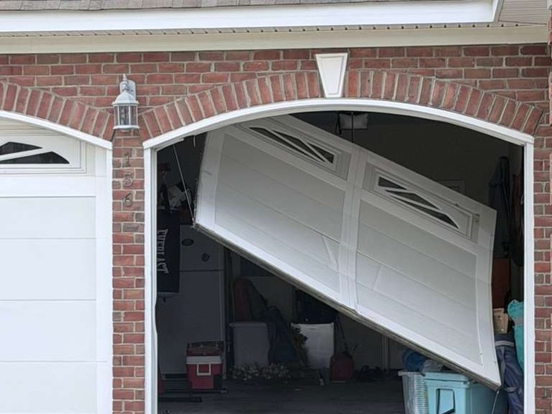 Off-Track Garage Door Repair job by Hamilton of Shoreline in Mountain View (photo 1)